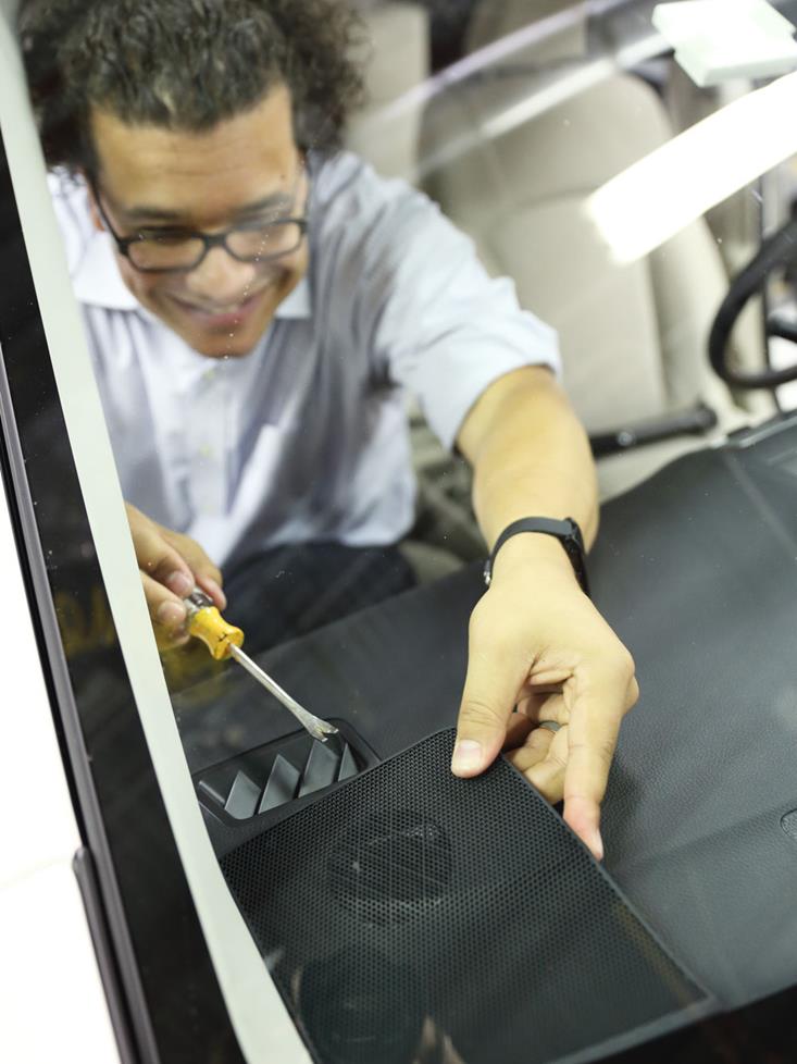 Mark removes the grille to access the tweeter.